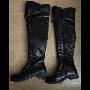 Thigh high black boots